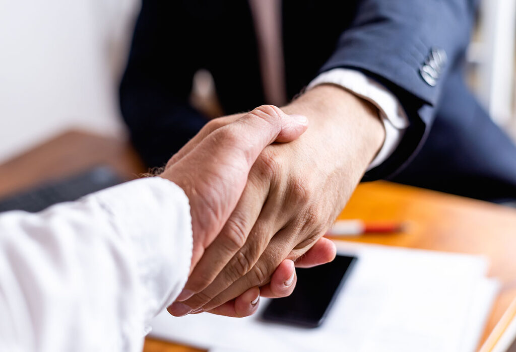 Businessman handshake close up. Man handshake fro business deal. Handshake. Business manager handshake client. Businessman and client handshake. Partnership handshake. Business deal.